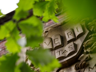 Veritas shield on Johnston Gate.
