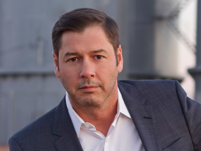 Chris James in a suit