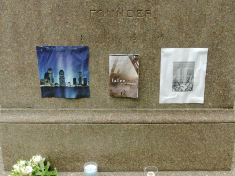 A small memorial to 9/11 in front of the John Harvard statue