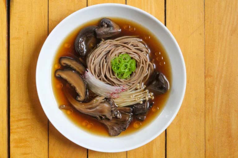 A bowl of soba noodle soup