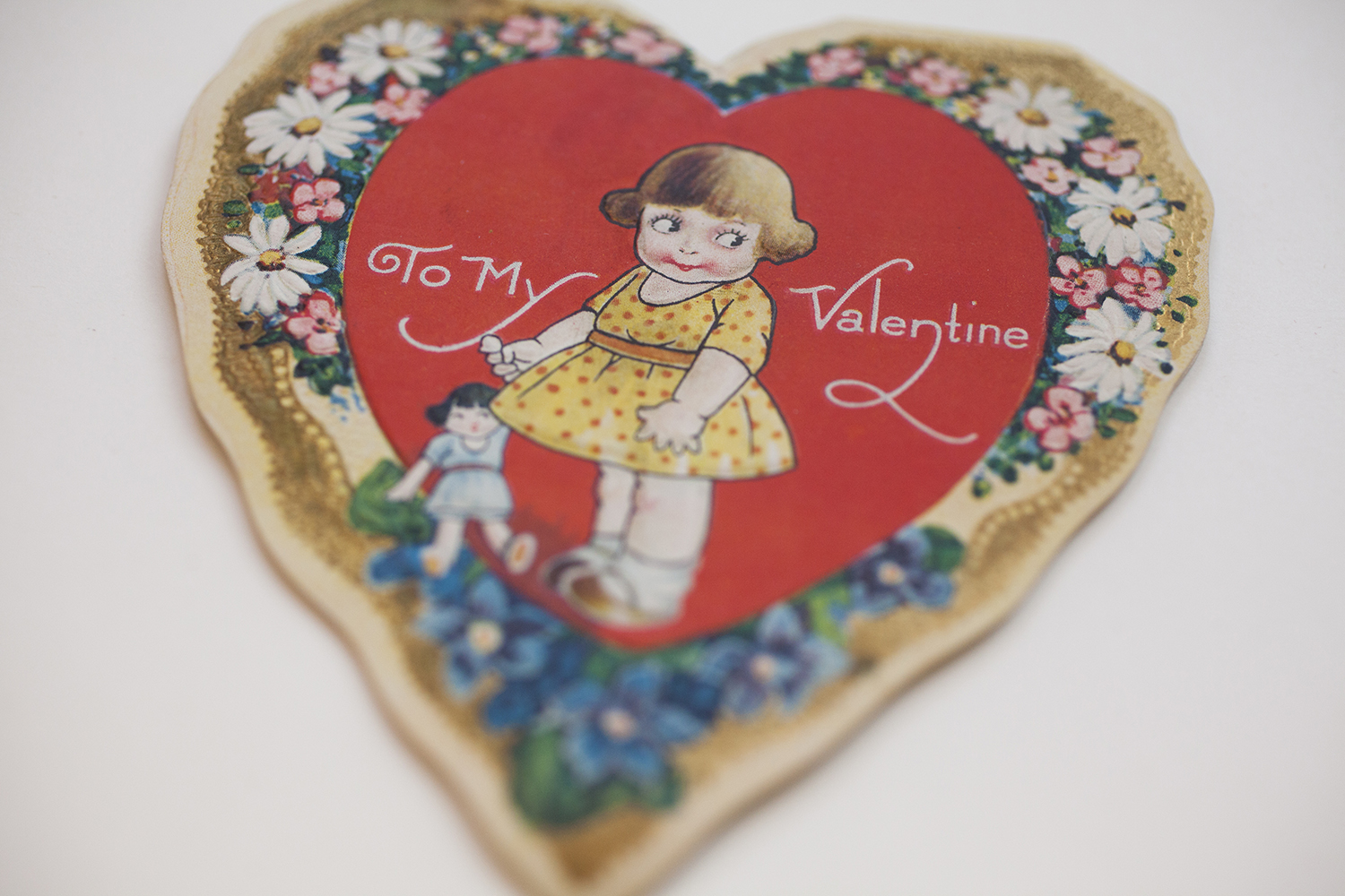 A heart shaped card that says