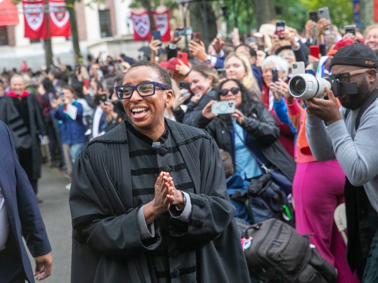 Claudine Gay walking toward the stage during her inauguration