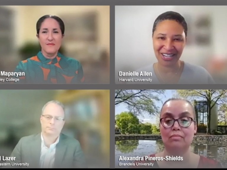 A zoom screen with four Harvard faculty members