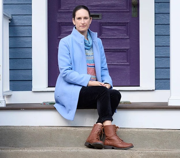 Bethany Kotlar sitting on steps