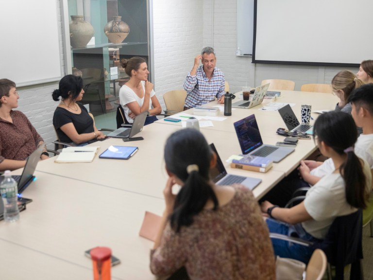 A Harvard class in a small classroom